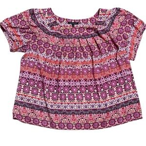 Sarah Michelle vibrant colored short-sleeved top